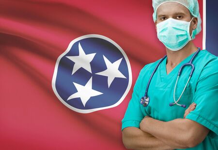 Surgeon with USA states flags on background - Tennesseeの写真素材