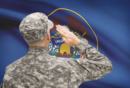Soldier saluting to USA state flag conceptual series - Utahの写真素材