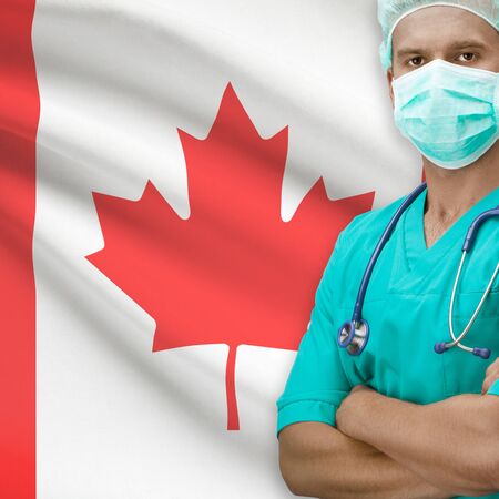 Surgeon with flag on background - Canadaの写真素材