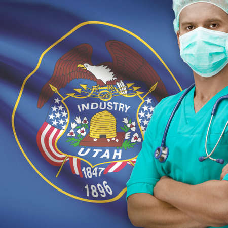 Surgeon with USA states flags on background - Utahの写真素材