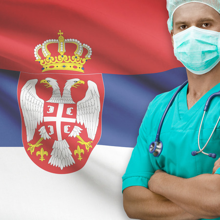 Surgeon with flag on background - Serbiaの写真素材