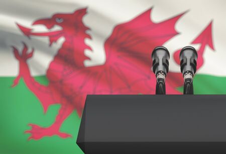 Pulpit and two microphones with a flag on background - Walesの写真素材
