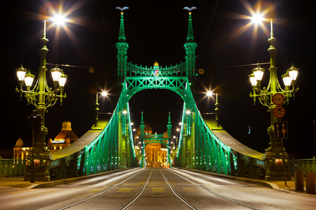 BUDAPEST, HUNGARY - JUNE 15, 2016: Eastern side of Liberty Bridge connecting Buda and Pest across the Dunabe River in Budapest, Hungary - June 15, 2016のeditorial素材