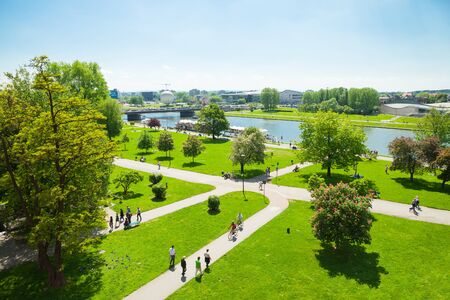 People walking along Vistula river bank at Wawel historical complex in Krakow, Polandのeditorial素材