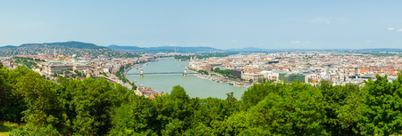 Panoramic view on the Dunabe river with bridge connecting Buda and Pest in Budapest, Hungaryの写真素材