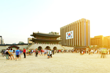 SEOUL, KOREA - AUGUST 14, 2015: Lots of people walking inside Gyeongbokgung Palace - main royal palace of the Joseon dynasty - Seoul, South Koreaのeditorial素材