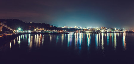 JEJU ISLAND, SOUTH KOREA - AUGUST 19, 2015: Panoramic view on Sogwiton city harbor during night time...