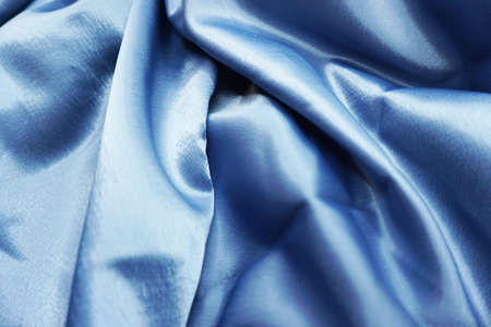 Blue satin fabric as background, closeup. Space for textの写真素材