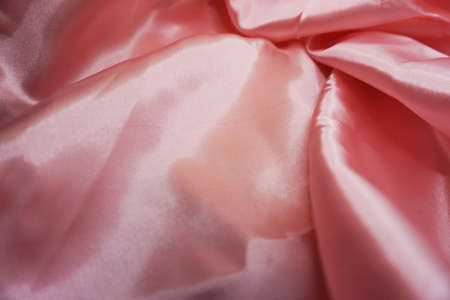 pink satin fabric texture background close up with copy space for designの写真素材