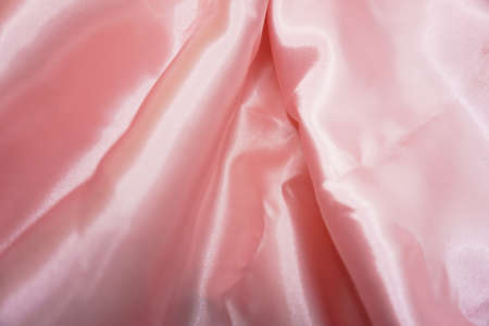 Smooth elegant pink silk can use as wedding background. Top viewの写真素材
