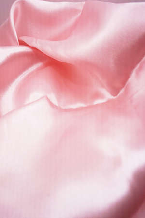 pink satin fabric texture background, soft focus, copy spaceの写真素材