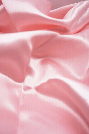pink satin fabric texture background, soft focus, copy spaceの写真素材