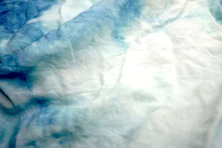 Blue and white tie dye fabric. Abstract background and texture for design.の写真素材