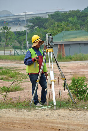 Surveyor with survey equipmentのeditorial素材