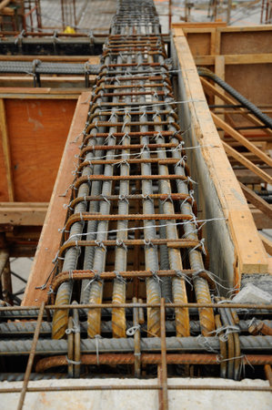 Fabrication of steel reinforcement bar for beams and timber formwork. The reinforcement bars provide...