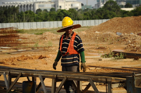A bar binder working at binding yard in construction siteのeditorial素材