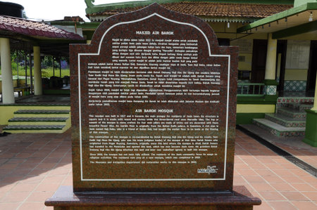 Information stone of Air Barok Mosque located in Jasin Town in Malacca, Malaysia. The mosque was bilt in 1917 and became the main mosque for resident of Jasi Town. The mosque represent the local Malacca Mosque architecture styleの写真素材
