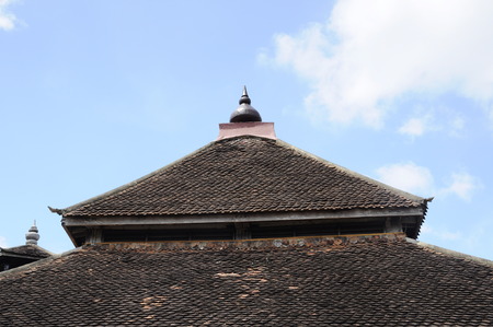 Roof detail of Masjid Kampung Laut at Nilam Puri Kelantan, Malaysia. Built in 1400s with traditional tropical architecture style using wood as the major material.の写真素材