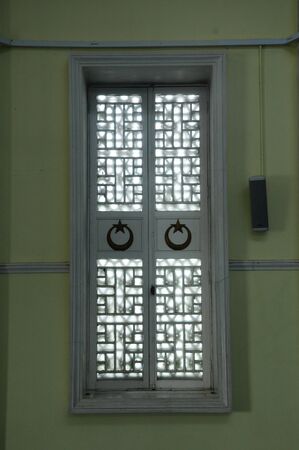Window detail at Masjid Jamek Bandar Mersing, it was completed in 1956. Masjid Jamek Mersing was built on the concept of South African architecture.のeditorial素材