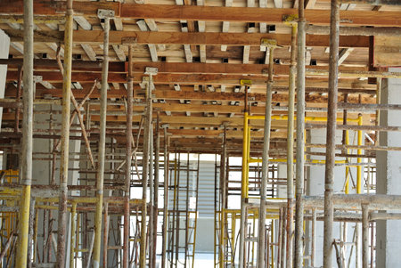 Scaffoldings erected to support building formwork and also function as the platform for construction workers standing.の写真素材