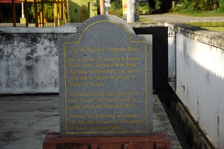 Information stone of The Old Mosque of Pengkalan Kakap located in Merbok Kedah Malaysia. It was build around 1800 with traditional Malay architectural style and considered as oldest Mosque in Pengkalan Kalap Kedah Malaysia.のeditorial素材