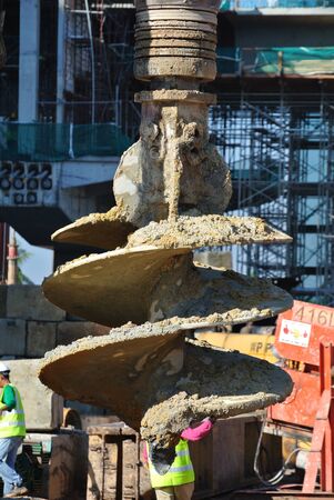 SELANGOR, MALAYSIA  MARCH, 2015: Bore pile rig auger at the construction site in Malaysia. This heavy machine used during the foundation work.のeditorial素材