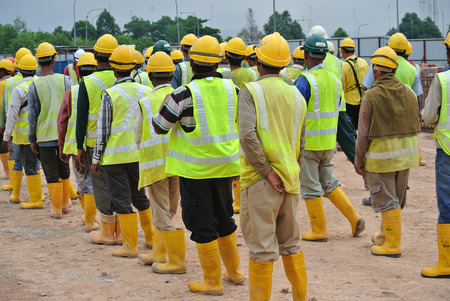 MELAKA, MALAYSIA  FEBRUARY13, 2015: Group of construction workers assemble at the open space in the construction site.のeditorial素材