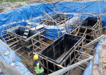 JOHOR, MALAYSIA -JUNE 16, 2015: Pile cap formwork with reinforcement bar in it and the excavated...