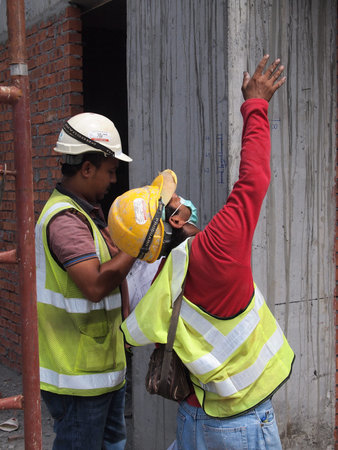 SELANGOR, MALAYSIA -JANUARY 14, 2017: Construction workers working at the construction site at...