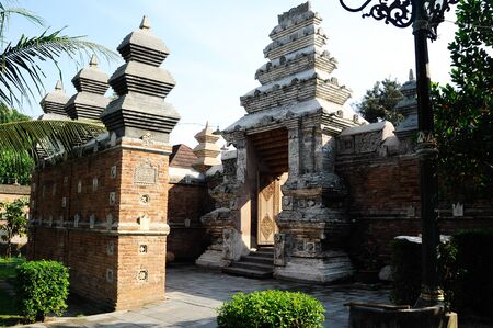 Entrance arch at old Masjid Besar Mataram Kotagede, Jogjakarta Indonesia. The arch was made from brick and hand made carving stone in traditional Balinese Styleのeditorial素材