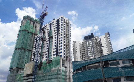 Construction site in progress at Putrajaya, Malaysia during daytime. Daily activity is ongoing.