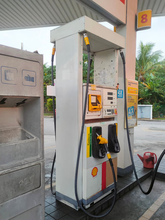 SELANGOR, MALAYSIA -MARCH 05, 2020: Shell petrol station and fuel pump dispenser. Shell provided a...
