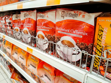 SEREMBAN, MALAYSIA -JUNE 8, 2020: Selected focused of 3 in 1 drinks packed in the soft pack and...