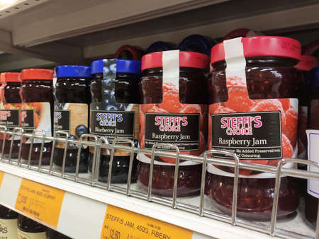SEREMBAN, MALAYSIA -MARCH 16, 2020: A variety of fruit jams are on display at a supermarket. Separated by type to facilitate customers. Tag with the price tag.のeditorial素材