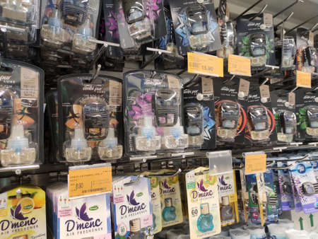 KUALA LUMPUR, MALAYSIA - OCTOBER 14, 2019: Various brand of car perfumes display for sale on the rack inside the supermarket. Sorted by the brand to make easy for the customer to choose.のeditorial素材