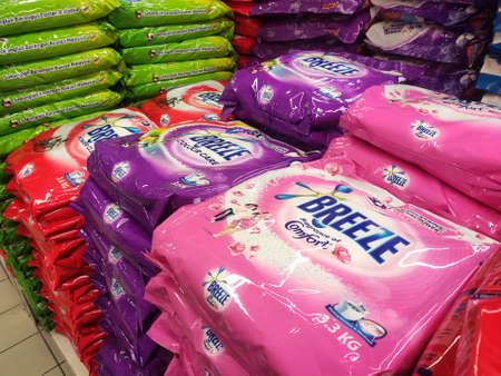 KUALA LUMPUR, MALAYSIA -MARCH 30, 2020: Selected focused powder detergent in plastic packaging displayed stacked together inside the huge supermarkets. Sorted by brand and price.のeditorial素材