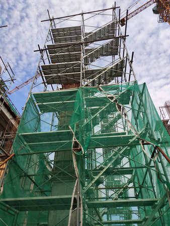 SHAH ALAM, MALAYSIA -AUGUST 6, 2020: Temporary staircase and scaffolding are used in the...