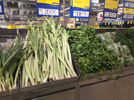 SEREMBAN, MALAYSIA -SEPTEMBER 6, 2020: Various types of vegetables are displayed on shelves for sale in supermarkets. Isolate by type and put a price tag.の写真素材