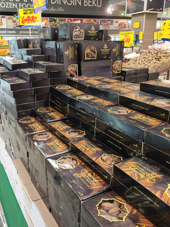 SEREMBAN, MALAYSIA -JULY 14, 2020: Dates are sold in boxes and sorted by brand and price tagged....