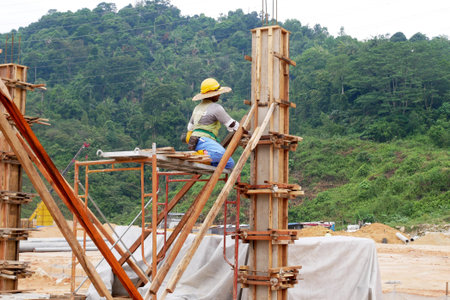 KUALA LUMPUR, MALAYSIA -SEPTEMBER 19, 2020: Column timber formwork and reinforcement bar at the...
