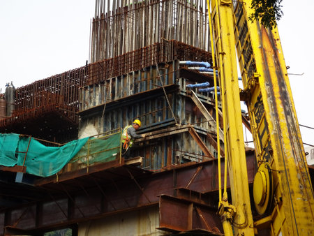 MALACCA, MALAYSIA -MARCH 14, 2020: Construction workers working at height at the construction site....