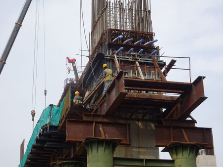 MALACCA, MALAYSIA -MARCH 14, 2020: Construction workers working at height at the construction site....
