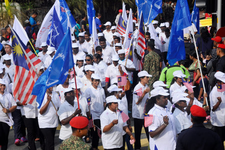 SEREMBAN, MALAYSIA -AUGUST 31, 2017: Members of political party Barisan National holding Barisan...