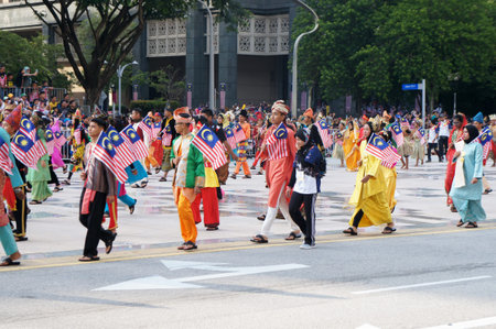 PUTRAJAYA, MALAYSIA -AUGUST 31, 2019: Teenagers wearing Malaysian ethnics and tribes traditional...