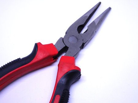 Needle Nose Pliers also known as pointy nose pliers or long nose pliers isolated on white...