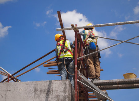 SEREMBAN, MALAYSIA -JULY 01, 2016: Construction workers working at the construction site at...