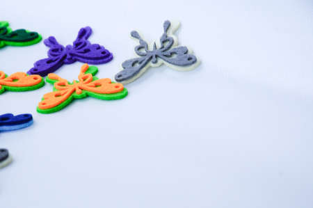 Images of butterflies made of colourful felt fabrics. Isolated on white background.の写真素材