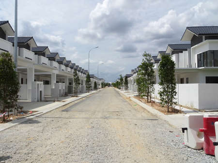 SEREMBAN, MALAYSIA -JUNE 18, 2019: New double story luxury terrace house under construction in Malaysia.  Designed by an architect with a modern and contemporary style.のeditorial素材