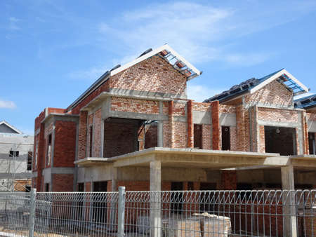 SEREMBAN, MALAYSIA -JUNE 18, 2019: New double story luxury terrace house under construction in Malaysia.  Designed by an architect with a modern and contemporary style.のeditorial素材