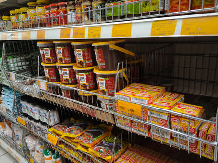 PENANG, MALAYSIA -JANUARY 5, 2021: Selected focused on the spices are sold in commercial packages and displayed on shelves in the supermarket. Sort by brand and type to make it easier to choose.のeditorial素材